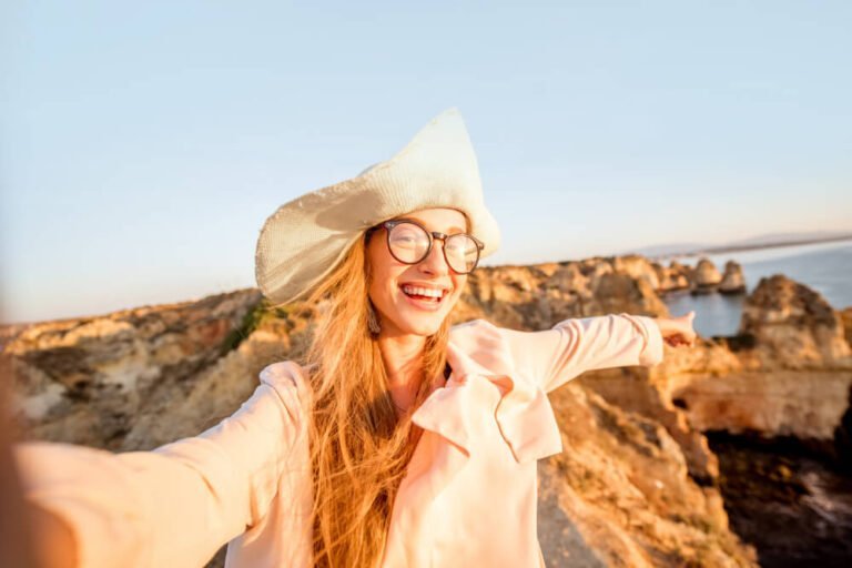 a person wearing a white hat and glasses