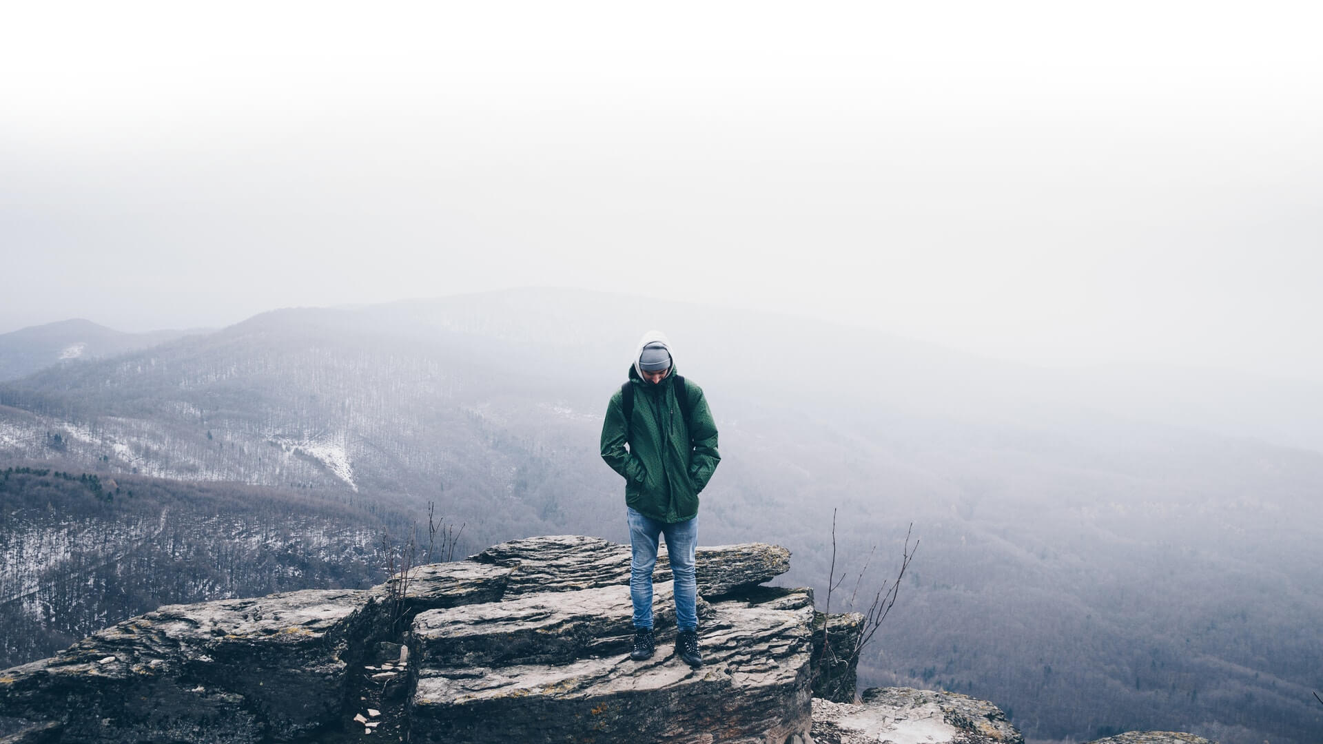 a man standing on a rock